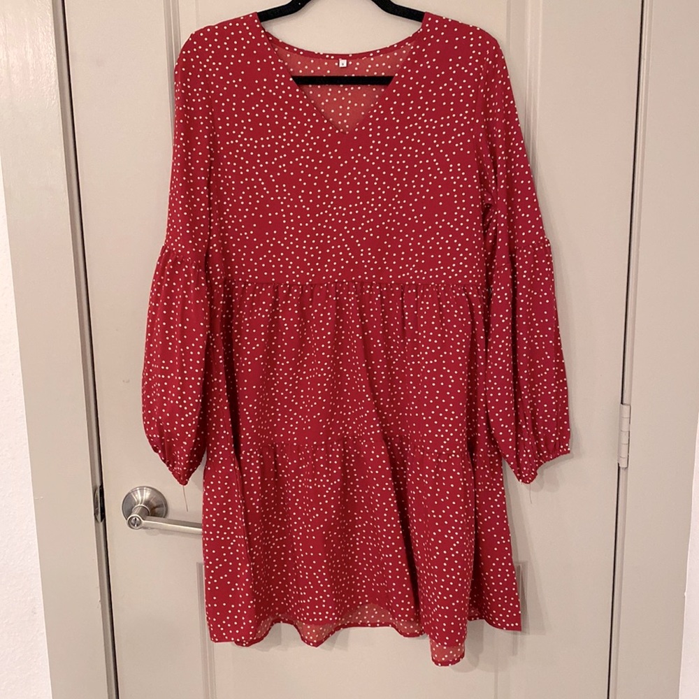 Red and white polka dot long sleeve dress.